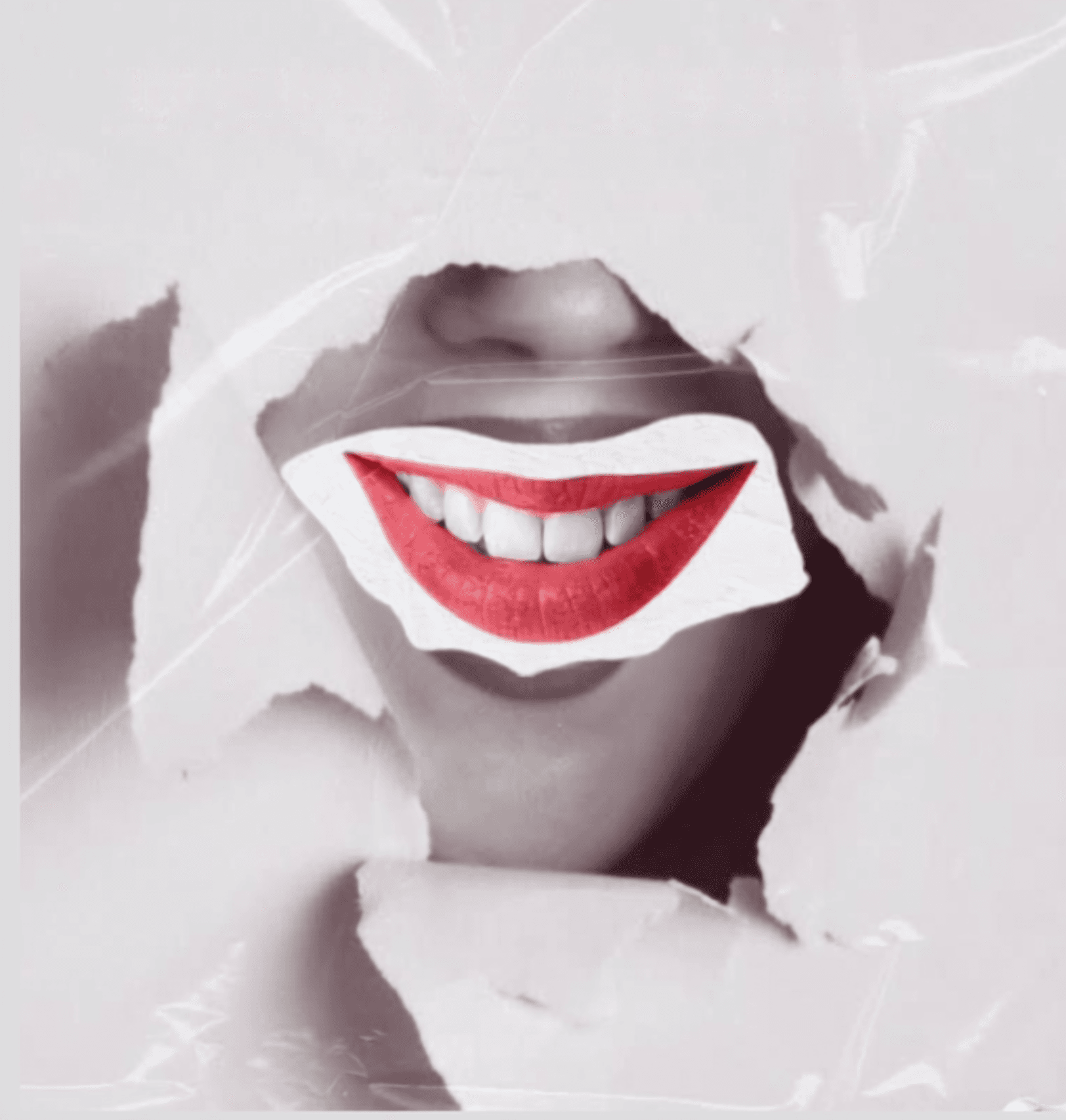 Bright confident smile bursting through paper